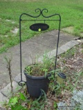 (OUT) WELCOME SIGN; HAS A LANTERN HOLDER ON THE BASE AND MEASURES 3 FT TALL