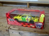 (ATTIC) DIECAST COLLECTIBLE CAR; RACING CHAMPIONS 1:24 SCALE #36 M&M'S CAR. BRAND NEW IN THE BOX!