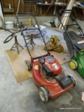 (GARAGE) CRAFTSMAN LAWN MOWER; 6.75 HP 22 IN CUT PUSH MOWER IN RED AND BLACK. HAS GOD COMPRESSION.