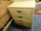 CHEST; 4 DRAWER CHEST WITH CAST IRON PULLS. IS IN EXCELLENT CONDITION AND MEASURES 2 FT 6 IN X 1 FT