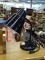 ADJUSTABLE ARM LAMP; BLACK FLEX ARM DESK LAMP WITH SILVER TONED SWITCH. MEASURES 12 IN TALL