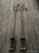 TIKI TORCHES; PAIR OF CAST METAL TIKI TORCHES IN EXCELLENT CONDITION. MEASURE 2 FT 11 IN TALL