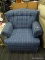 ARM CHAIR; BLUE UPHOLSTERED ARM CHAIR WITH BUTTON TUFTED BACK AND ROLLED ARMS. HAS A REMOVABLE SEAT