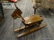 SMALL WOODEN ROCKING HORSE; A ROCKING HORSE FOR A SMALL CHILD OR TODDLER.