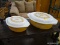 PYREX OVENWARE; TWO PYREX BUTTERFLY GOLD OVAL CASSEROLE DISHES WITH MATCHING WHITE LIDS. INCLUDES A