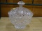 LIDDED CRYSTAL BOWL; CRYSTAL BOWL AND LID WITH CARVED FLORAL DESIGNS.