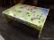 TOY TRAIN TABLE; TRAINS ON THE SIDE, TOWN ON THE PLAY BOARD, 1FT TALL X 2FT WIDE X 2FT 9IN LONG.