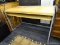 WOOD GRAIN OFFICE DESK; LIGHT WOOD GRAIN DESK WITH FULL LENGTH PULL OUT SURFACE AND BRUSHED SILVER