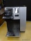 KEURIG COMMERCIAL COFFEE MACHINE; BLACK AND BRUSHED SILVER TONE KEURIG COFFEE MAKER. MODEL NO. B150.