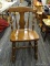 OAK SIDE CHAIR; HAS A FIDDLE & SPINDLE BACK WITH PLANK BOTTOM SEAT AND TURNED LEGS. MEASURES 1 FT 6