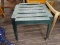 OUTDOOR PATIO SIDE TABLE; DARK GREEN PLASTIC PATIO SIDE TABLE WITH SQUARE TOP. MEASURES 1 FT 5 IN X