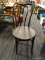 VINTAGE PARLOR CHAIR; VINTAGE WOODEN ROUNDED BACK PARLOR CHAIR WITH ROUND SEAT AND BRACED TAPERED