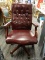 HIGH BACK EXECUTIVE OFFICE CHAIR; BURGUNDY BUTTON TUFTED LEATHER-LOOK BACK AND PADDED SEAT WITH