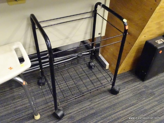 METAL ROLLING CART; BLACK METAL ROLLING CART WITH BARS AROUND THE TOP AND A METAL WIRE SHELF ON THE