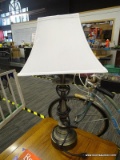 BRUSHED METAL TABLE LAMP; THIS TABLE LAMP HAS A RECTANGULAR SHAPED WHITE LAMP SHADE THAT SITS ON A