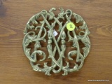 VIRGINIA METALCRAFTERS TRIVET; INCLUDES A BRASS COLONIAL WILLIAMSBURG CYPHER CW10-4 (1950). MEASURES