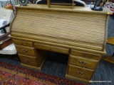ROLL TOP DESK; S-ROLL DESK WITH INTERIOR CUBBY HOLES, 3 SIDE DRAWERS ON EITHER SIDE AND 1 CENTER