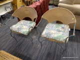 PAIR OF WICKER AND METAL PATIO CHAIRS; HAVE LEAF PATTERN CUSHIONS AND ARE IN EXCELLENT CONDITION.