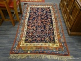 HAND KNOTTED ORIENTAL AREA RUG; BEAUTIFUL RUG IN HUES OF BLUE, RED, AND CREAM WITH A FLORAL PATTERN.