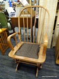 WIDE BACK WOODEN GLIDER; ROUNDED WIDE BACK WOODEN GLIDER CHAIR WITH ROUNDED ARMS AND AND SPRING SEAT