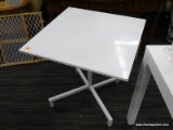 METAL TILT TOP TABLE; ONE OF A PAIR OF WHITE METAL TABLES. SQUARE TOP WITH HANDLE THAT WILL FOLD THE