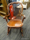 CARVED BACK VINTAGE ROCKER; DEEP CHERRY COLORED WOODEN ROCKING CHAIR WITH CARVED TOP, CARVED ROLLED