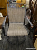 METAL PATIO CHAIR; BLACK METAL FRAME WITH SCROLLING DETAILING ALONG THE TOP CURVED ARMRESTS, AND