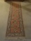 (BASE) RUNNER; MACHINE MADE ORIENTAL STYLE RUNNER IN MAUVE AND IVORY