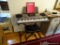 (DIN) RADIOSHACK KEYBOARD; HAS A BUILT IN CUSTOM TONE SYNTHESIZER AND ELECTRONIC DISPLAY. MODEL