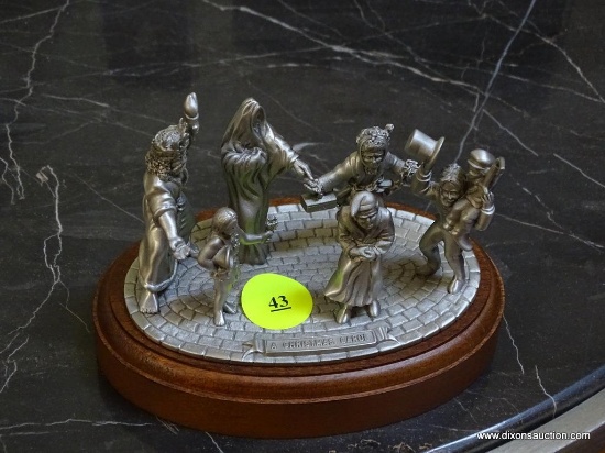(LR) CHRISTMAS CAROL STATUE; PEWTER AND WOOD BASE CHRISTMAS CAROL STATUE- 5 IN X 4 IN