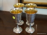 (DIN) STERLING GOBLETS; 4 ROGERS STERLING GOBLETS WITH GOLD FLASHING- 7 IN H. THESE GOBLETS WEIGH A