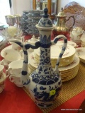(DR) BLUE & WHITE ORIENTAL EWER. MARKED ON THE BOTTOM WITH CHINESE SYMBOLS.