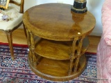 (LR) END TABLE- OVAL WALNUT END TABLE WITH BANDED INLAID TOP COLUMNED SUPPORTS AND 2 SHELVES- 29 IN