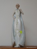(LR) ROYAL DOULTON FIGURINE- 1985 REFLECTIONS BY ROYAL DOULTON- DEBUT- HN 3046- 13 IN H