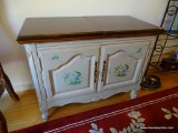 (DIN) FLIP-TOP SERVER; DAVIS CABINET CO. FLORAL PAINTED SERVER WITH 2 FLIP-TOPS AND 2 DOORS. IS IN
