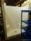 AKER DOUBLE SEAT SHOWER INSERT; DOUBLE SEAT WHITE SHOWER INSERT WITH TWO SEATS AND TWO LEDGES. HAS
