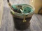 BUCKETS AND HALTERS; 2 PLASTIC 5 GAL BUCKETS WITH HALTERS