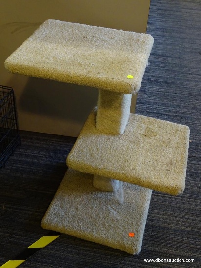 CAT TREE; TAN CARPETED 3 TIERED CAT TREE/SCRATCHING POST WITH STURDY WOOD FRAME. MEASURES 2 FT 2 IN
