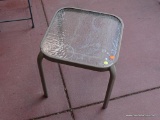 (OUT) GLASS TOP PATIO SIDE TABLE; SQUARE PATIO SIDE TABLE WITH FROSTED GLASS TOP SITTING ON A TAN