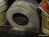 INDUSTRIAL BLOWER; HAS A METAL CASE AND MEASURES 19 IN X 17 IN.