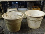 LARGE PLANTERS; SET OF 2 PLASTIC OUTDOOR PLANTERS. BOTH HAVE SOME WEATHERING AND STAINING. EACH