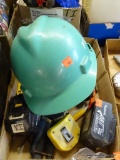 TRAY LOT OF ASSORTED ITEMS; LOT INCLUDES A GREEN HARD HAT, A TAPE MEASURE, 2 MAKITA 18V LITHIUM-ION