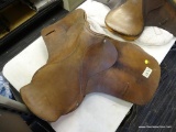 BUENOS AIRES 18 1/2 IN LEATHER HORSE SADDLE; COMES WITH A FLEECE SADDLE PAD. IS BROWN IN COLOR.