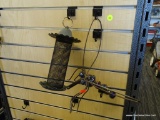MISC. YARD ITEMS; YARD ITEMS INCLUDE- METAL BIRD FEEDER- 9 IN L AND METAL AND GLASS BALL DRAGONFLY