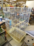 METAL BIRDCAGE; LARGE WHITE METAL WIRE BIRDCAGE WITH TOP CARRYING HANDLE, AND LARGE FRONT LATCHING