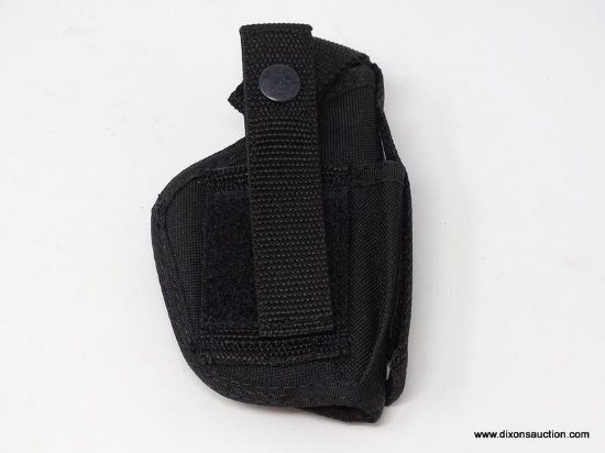 CLIP-ON VELCRO HOLSTER; MADE IN THE USA. MEASURES 5 IN LONG