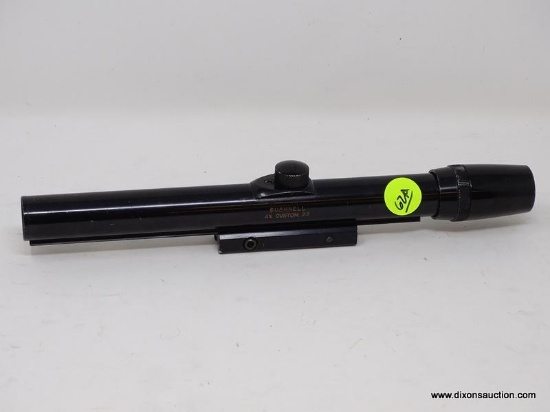 18MM RIFLESCOPE; BL #H37628. MADE IN JAPAN. MEASURES 10 IN LONG.