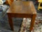 MAHOGANY SIDE TABLE; MAHOGANY TABLE WITH A CHECKBOAR WOOD PATTERN IN THE MIDDLE. STAND ON 4 CURVED