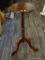 MAHOGANY SIDE TABLE; MAHOGANY SIDE TABLE WITH A ROUND TOP WITH ROUNDED EDGES WITH 1 LONG DETAILED