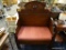 VICTORIAN STYLE BENCH; VICTORIAN STYLE MAHOGANY CAMELBACK BENCH WITH BRACKET DETAILED ARM RESTS AND